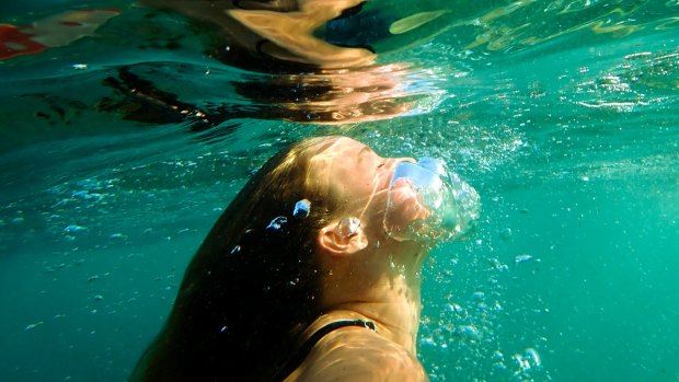 A swimmer cools off in Giles Baths at Coogee in Sydney's east.