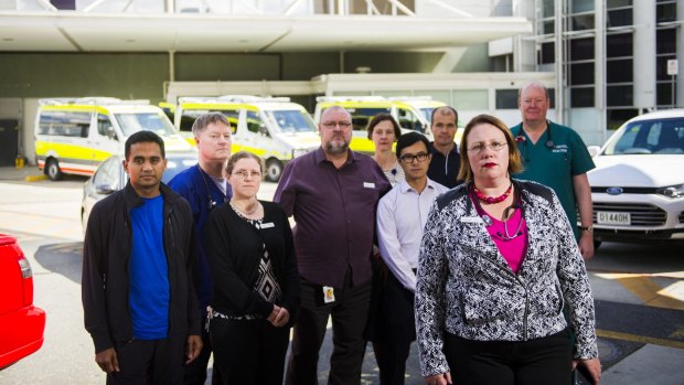 Bronwyn Avard (front) and the other Canberra Hospital staff who are taking strike action.