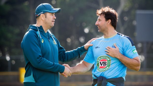 Gidday: Wallabies coach Michael Cheika and NSW coach Laurie Daley share a quiet moment at Leichhardt Oval.