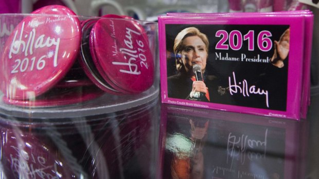 Political campaign items for US Democrat Presidential hopeful Hillary Clinton are seen for sale at a gift shop on June 8, 2015 at Ronald Reagan National Airport in Washington. AFP PHOTO/Paul J. Richards