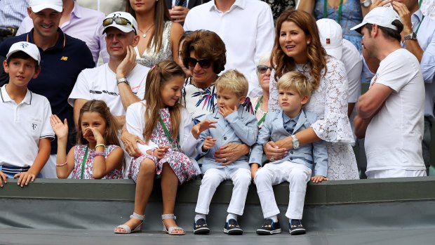 Roger Federer's wife Mirka and children celebrate his victory on Sunday.