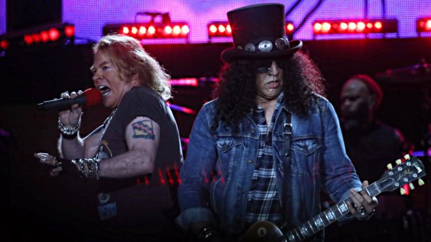 Guns N' Roses singer Axl Rose (left) and guitarist Slash perform at the MCG on Tuesday night.