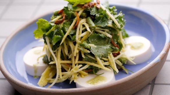 Silken tofu with green mango, snake beans and candied anchovies.