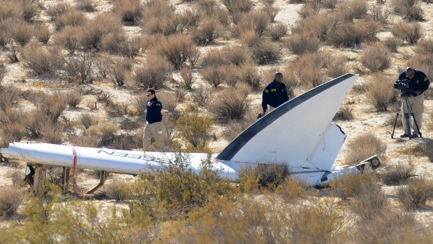 A US National Transportation Safety Board team surveys the wreckage of Virgin Galactic's SpaceShipTwo near Cantil, California.