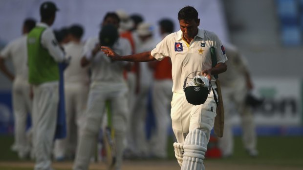 Century maker Younis Khan departs late on the first day.