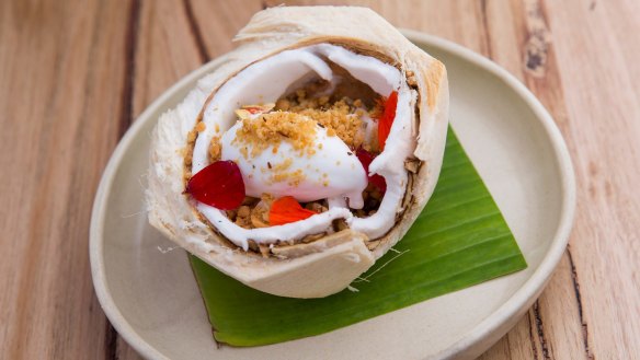 Coconut sorbet and jelly served in a young coconut.