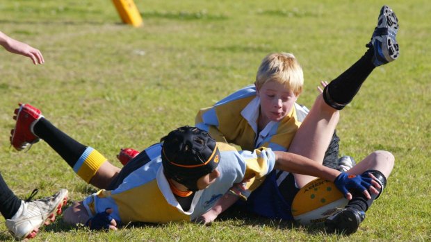 'High risk of serious injury': Schoolboy players at Waratah Oval in Gymea, Sydney.