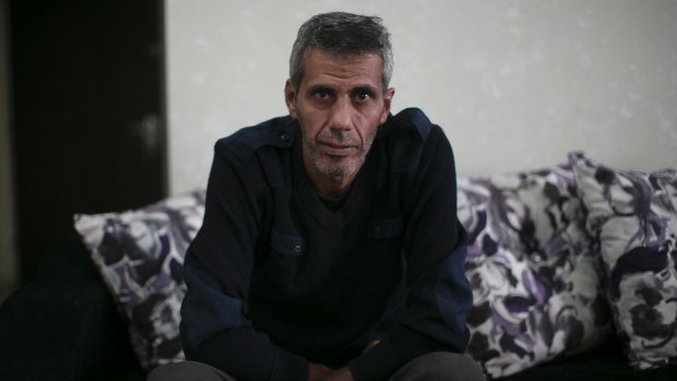 Ayman Ramiyeh, a civil servant, who said he and his wife saved for 20 years to buy their $US140,000 apartment, in the Kufr Aqab neighbourhood of Jerusalem.