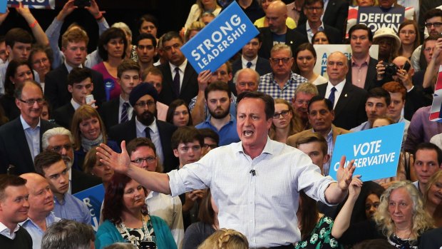 British Prime Minister David Cameron speaks to supporters during a rally at Hayesfield Girls' School in Bath on Monday.