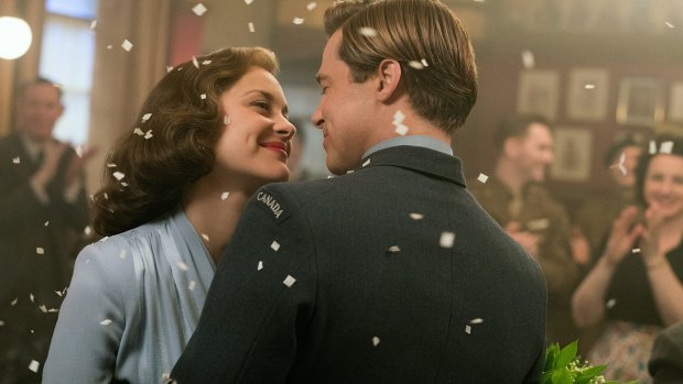 Marion Cotillard with co-star Brad Pitt in <i>Allied</i>.