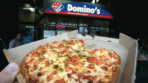 Domino's is taking on fast food rivals such as KFC and McDonald's by cutting the time it takes to buy pizza.
