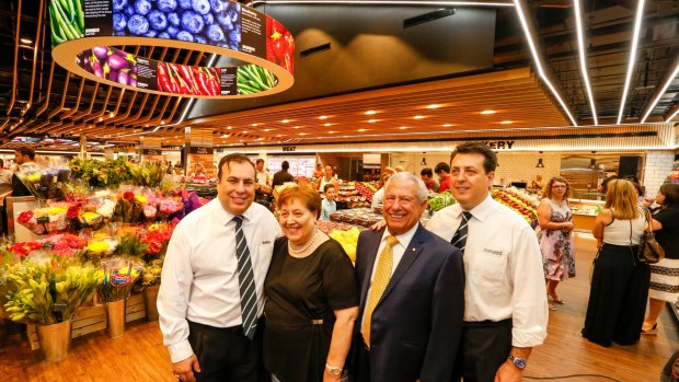 Joseph Romeo with his mother Elisabeth, father Antonio and brother Anthoney unveiled their new IGA store in Sydney's MLC Centre.
