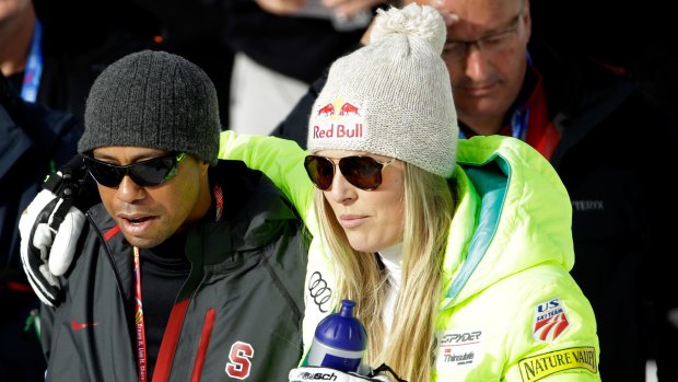  Happy?: Tigers Woods and his partner Lindsay Vonn  at a skiing competition in Colorado.