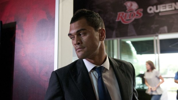 Ruffled: Karmichael Hunt leaves a press conference in Brisbane on Friday.