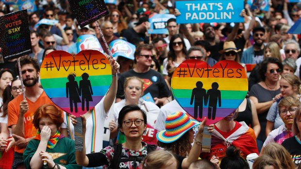 Supporters of marriage equality march in Sydney.