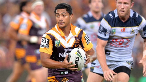 Political football: Anthony Milford in action for the Broncos.