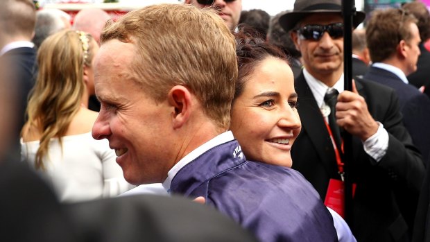 Kerrin McEvoy is congratulated by last year's Melbourne Cup winner, his sister-in-law Michelle Payne.