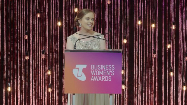 Elise Apolloni, pharmacist and partner at Capital Chemist Wanniassa, receiving her award as the national winner of the Telstra Young Business Woman of the Year in Melbourne on Tuesday night.