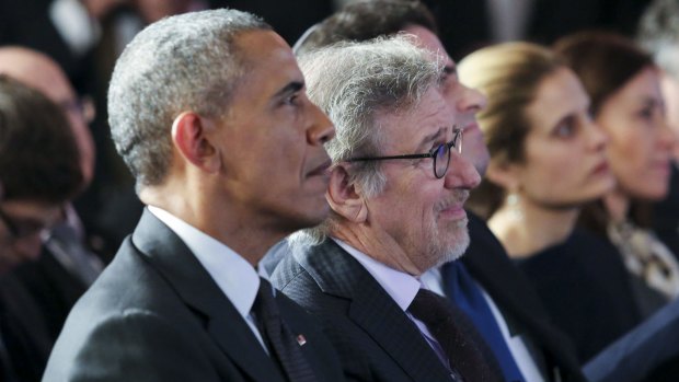 US President Barack Obama sits next to filmmaker Steven Spielberg at the Righteous Among the Nations award ceremony.