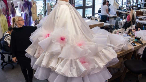 Gabriela Tylesova hard at work on Muriel's wedding dress.
