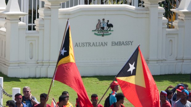 Protesters assembled outside the gates of the Australian embassy in Dili in February, demanding negotiations over the Timor Sea boundary.
