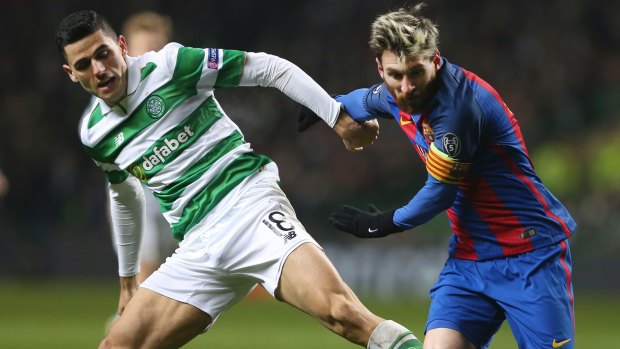 Tom Rogic, left, and Lionel Messi pictured during a Champions League match in 2016.