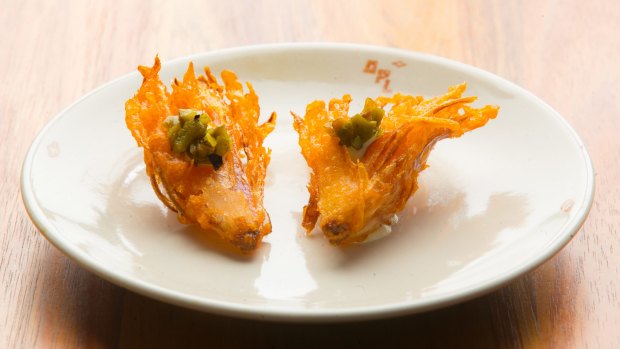 Like a bloomin' onion in miniature: fried shallot with jalapeno cashew sour cream.