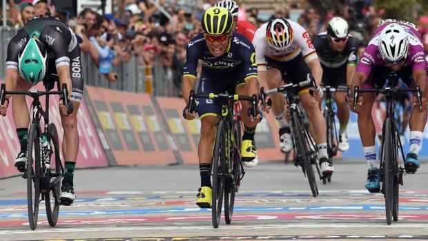 Success at last: Australia's Caleb Ewan sprints ahead of Sam Bennett, left, and Fernando Gaviria to win the seventh stage of the Giro d'Italia.