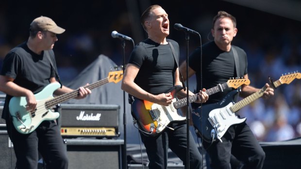 Bryan Adams performs at the AFL grand final at the MCG.