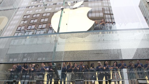 Staff at the Sydney store of Apple, one of many multinationals criticised for paying too little tax in Australia.