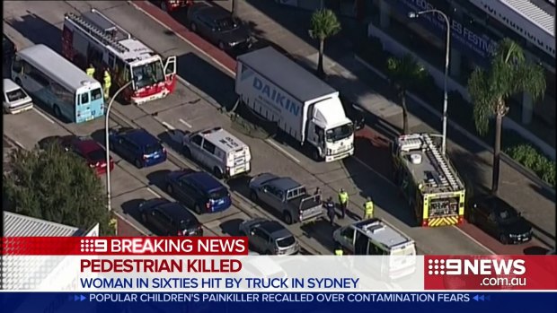 A female pedestrian has been killed after being hit and dragged along the street by a truck on Sydney's northern beaches.