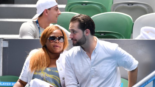 Williams' fiance, Alexis Ohanian, with Williams' sister, Isha Price, in the players' box.