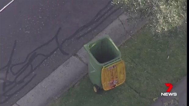 The body was discovered inside an abandoned rubbish bin.