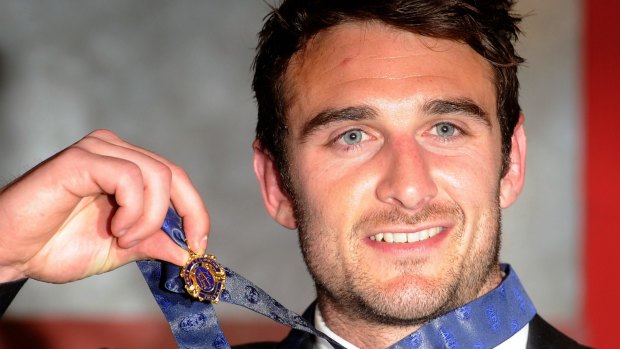 Banned Essendon player Jobe Watson with his 2012 Brownlow Medal.