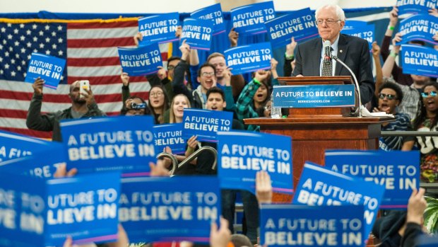 Donald Trump has threatened to send supporters to disrupt the rallies of Democratic candidate Bernie Sanders, seen here campaigning at the University of Illinois on Saturday.