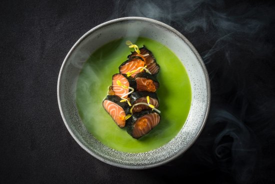 Smoking salmon sashimi, wasabi pea and nori.