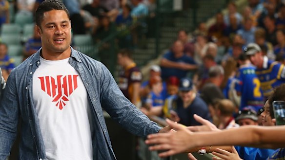 Back in blue and gold? Jarryd Hayne high fives the crowd at Pirtek Stadium earlier this season.