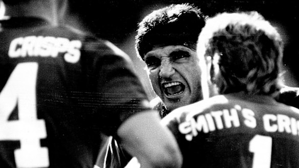 The face of aggression: Mario Fenech rallies his troops after a Balmain try in 1989.  