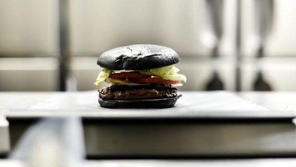 Like a whopper but black: The Kuro Diamond burger comes with cheese smoked with bamboo charcoal, black sauce made of squid ink, as well as lettuce, tomato, onion and mayonnaise.