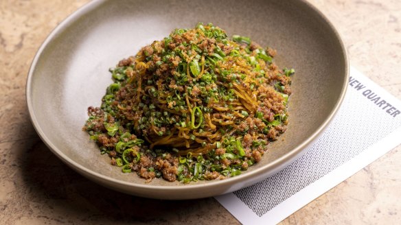 Wok-tossed egg noodles with duck.