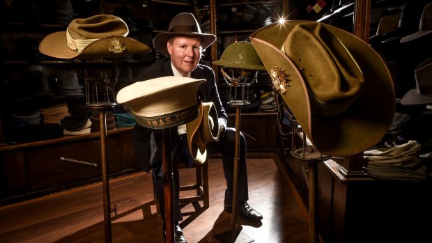 The manager of City Hatters, Craig Cochrane, with some of the KFF - khaki, fur and felt - hats.