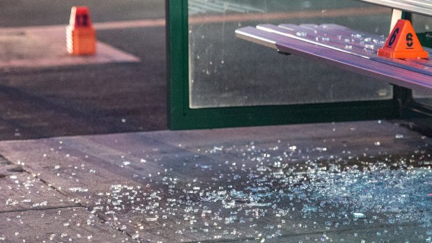 Shattered glass at the scene of the shooting at Caulfield South.