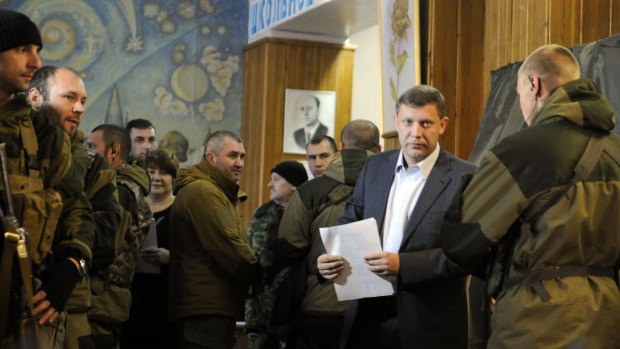 Winner: Alexander Zakharchenko (second from right) came out ahead in the questionable election.