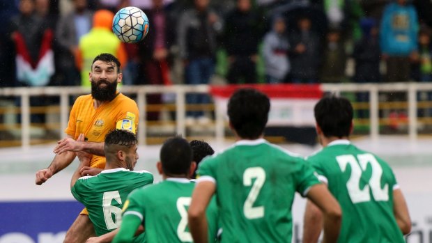 Mile Jedinak in action during the Socceroos draw with Iraq in Tehran on Thursday. 