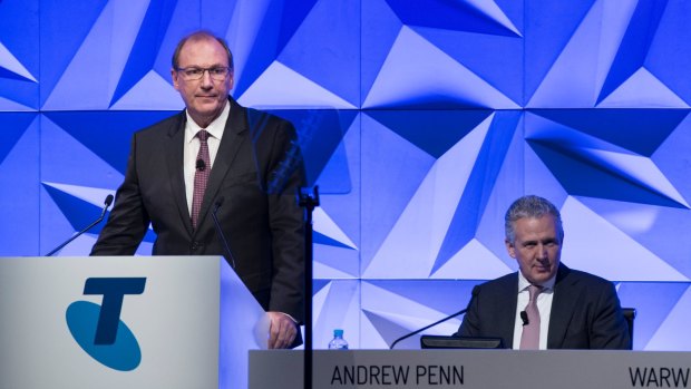 Telstra chairman John Mullen  (left) flagged the dividend cut.