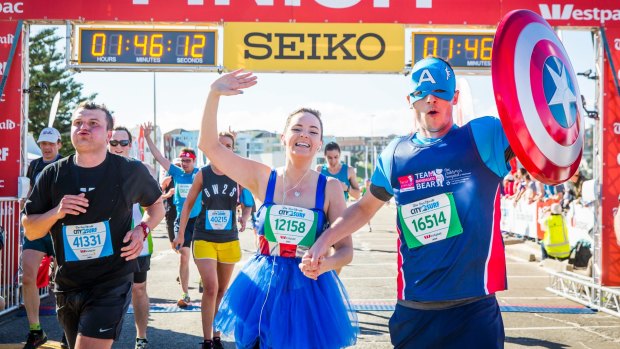 Tutus and superheroes were among the many colourful characters at the City2Surf finish line.