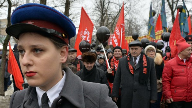 Russian Communist party supporters take part in a rally against the policies of the Russian government.