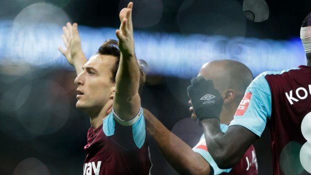 Reliable: West Ham United's Mark Noble celebrates after scoring from the penalty spot.