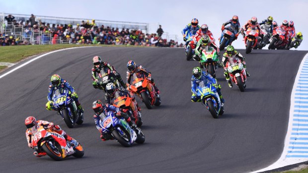 Off to a flier: Spanish rider Marc Marquez leads from the front through the first corners after securing pole position.