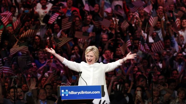 Hillary Clinton celebrates becoming the presumptive Democratic nominee on Tuesday night at a rally in Brooklyn, New York.
